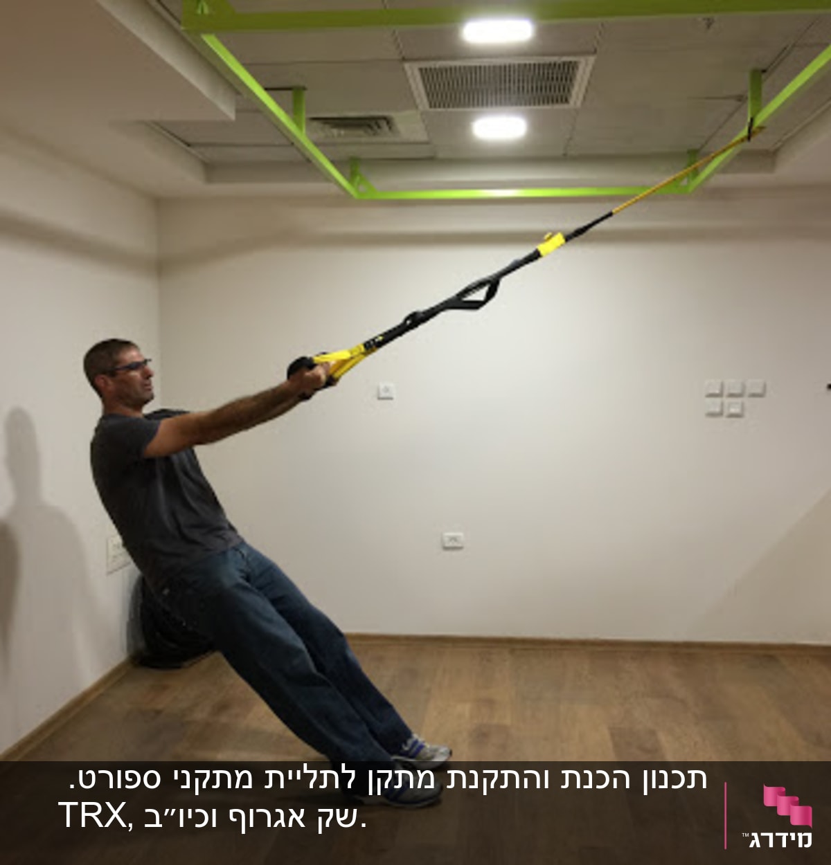 תכנון, הכנה והתקנה של מתקן לתליית שק אגרוף וTRX
